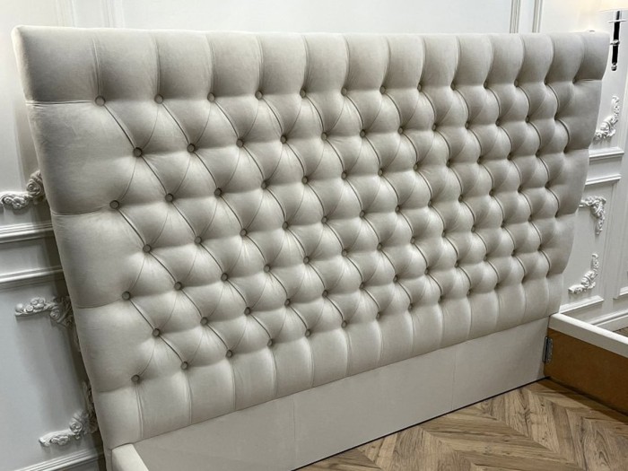 Перетяжка изголовья кровати в технике Капитоне